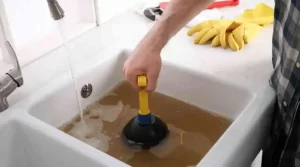 HOW DO YOU FIX A SLOW DRAINING SINK